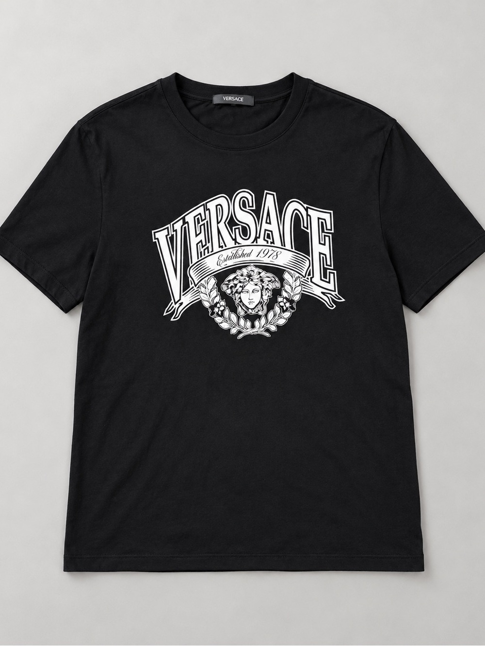 Authentic Versace black Medusa Crest graphic T-shirt in men’s size Large.